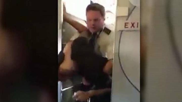 Pilot tackles drunk passenger who attacked flight attendant