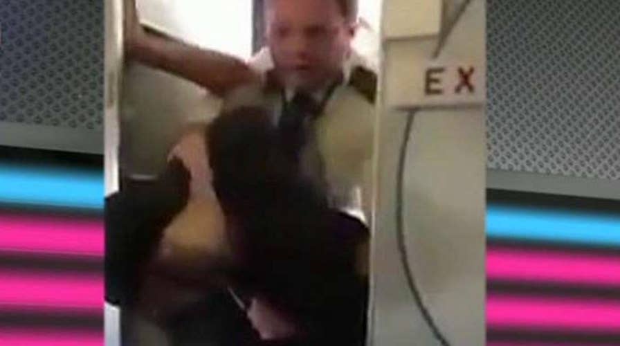 Kennedy's Topical Storm: Heroic Pilot Tackles Passenger