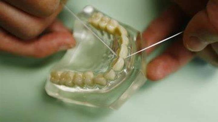 Dentist and Texas Rep. Babin makes the case for flossing