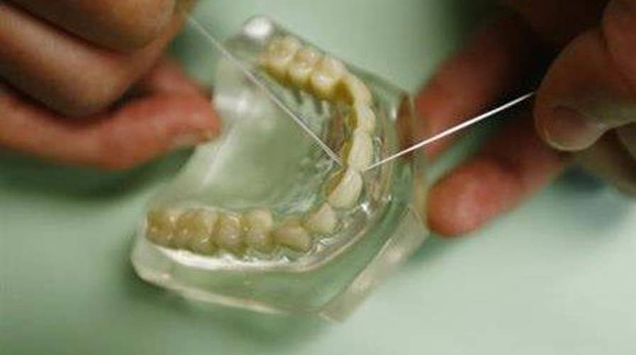 Dentist and Texas Rep. Babin makes the case for flossing
