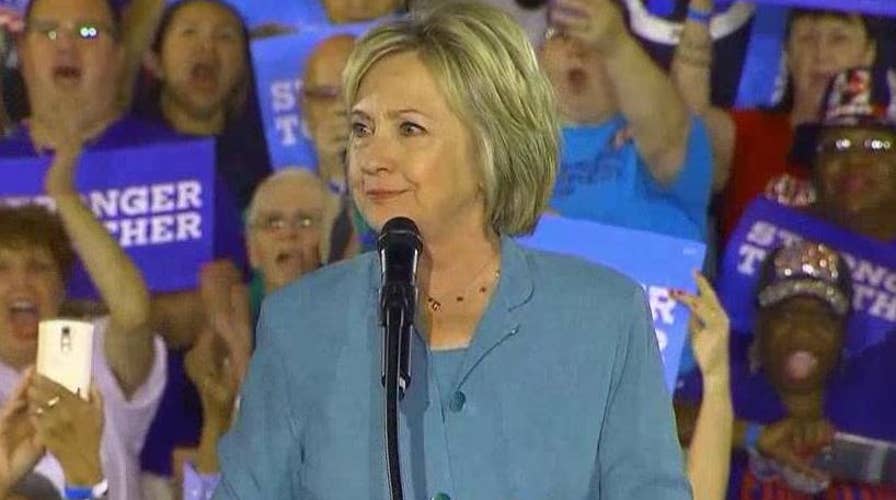 Clinton attacks Trump's business record at Las Vegas event