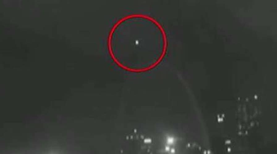 Mystery light in the sky hovers over St Louis Gateway Arch