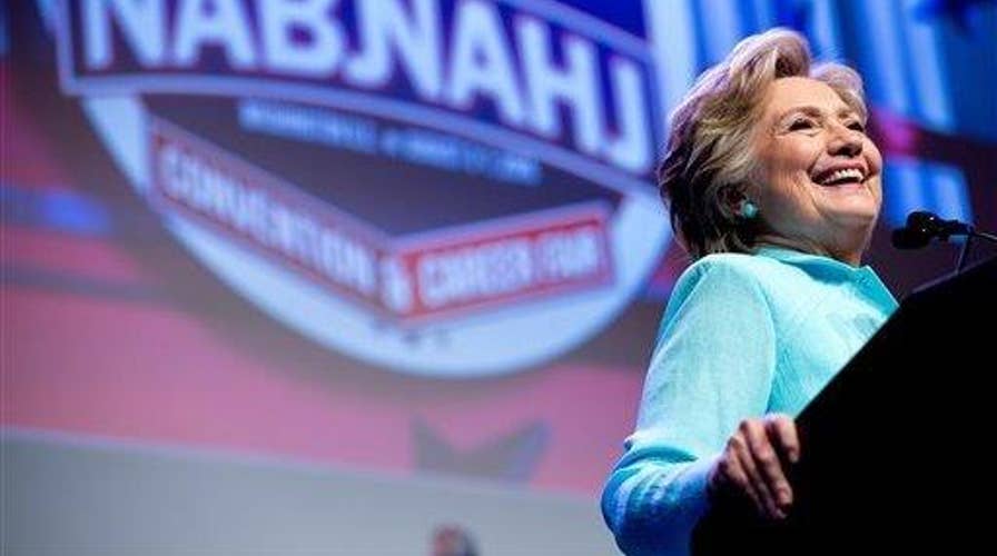 Clinton tries to clarify remarks about FBI investigation 