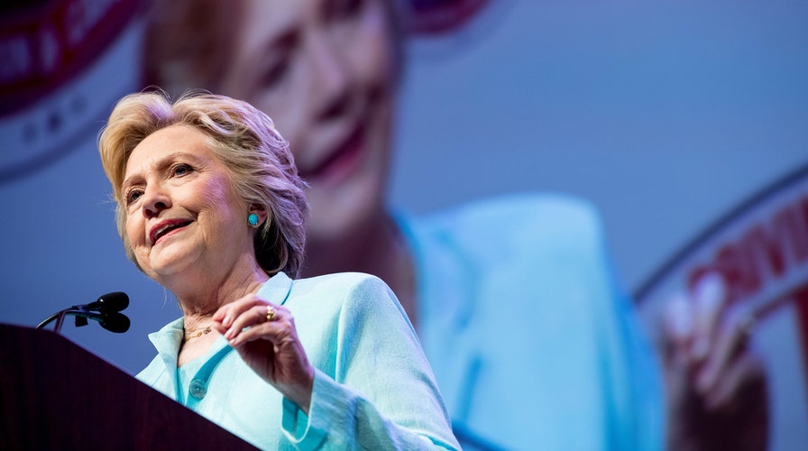 Clinton attempts to clarify comments on email probe