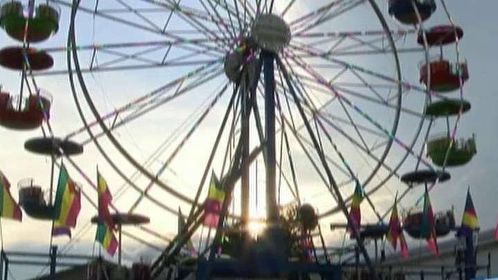 3 children fall out of Ferris wheel basket at county fair