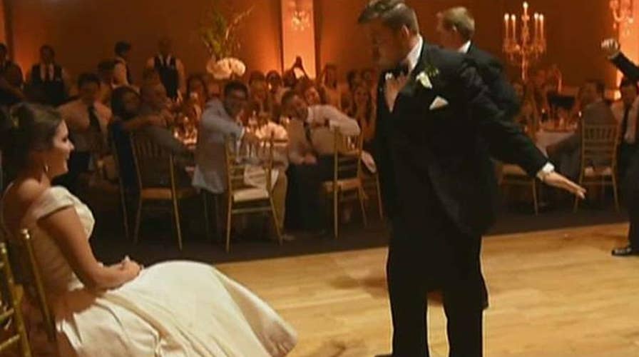 Groom shocks bride with choreographed dance
