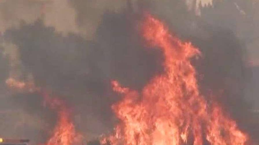 Wildfire in San Bernardino National Forest threatens homes