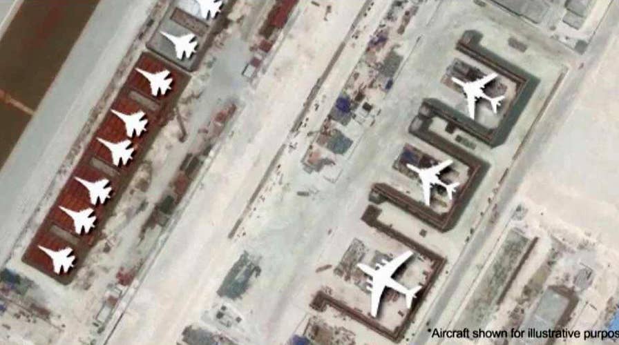 Satellite images show military buildup in South China Sea