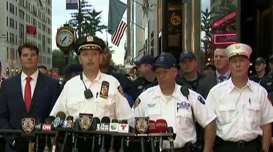 Officer describes grabbing Trump Tower climber