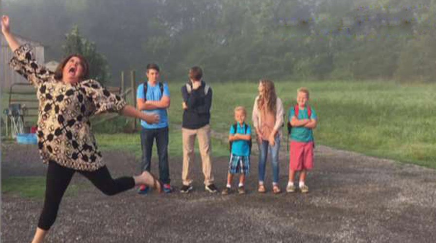 Mom jumps for joy while sending kids back to school