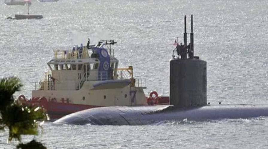 Citing Clinton, sailor seeks mercy in classified pics case