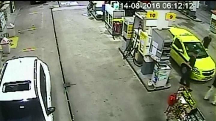 Surveillance video shows US swimmers at Rio gas station
