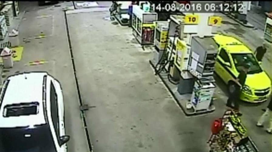 Surveillance video shows US swimmers at Rio gas station