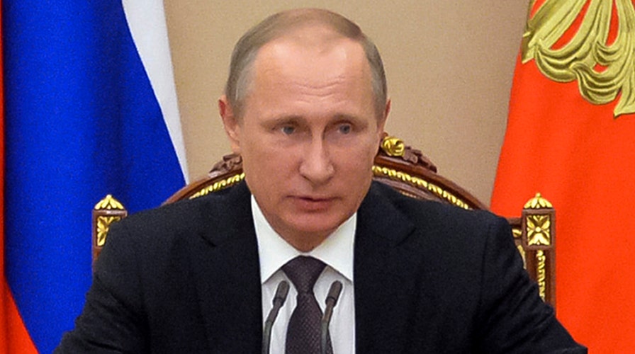 Putin visits Crimea amid new tensions