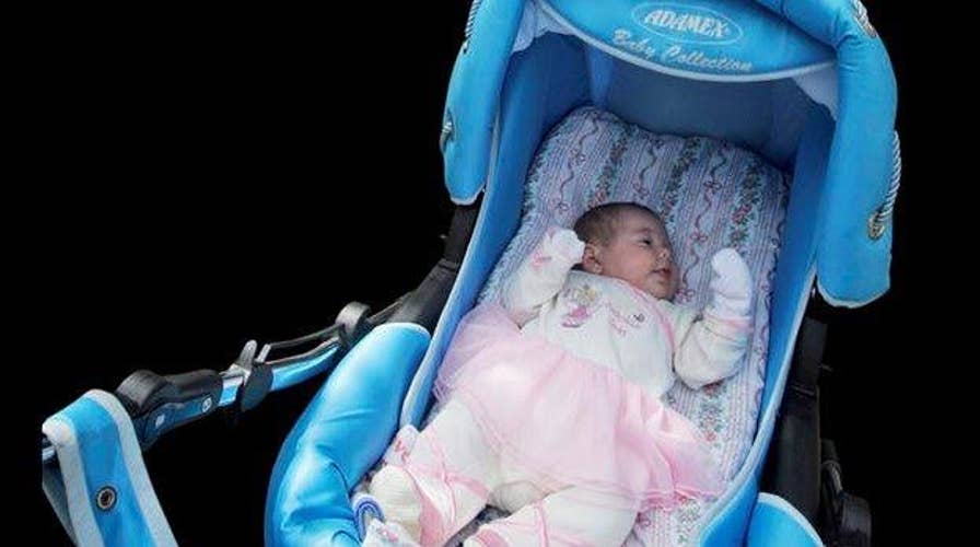How to safely place a baby into a crib or stroller