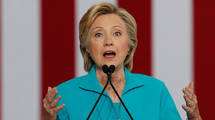 Trump campaign blasts Clinton's 'gutter politics' on racism