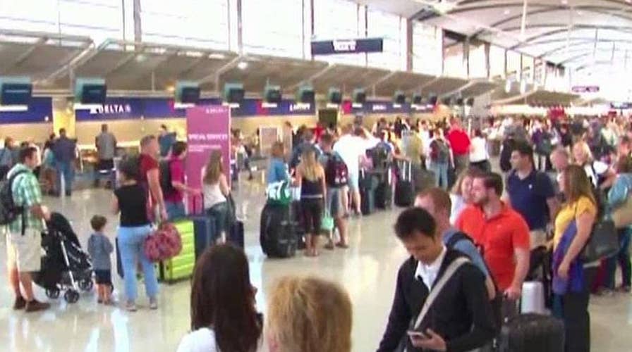 Computer problems cause major backups at airports