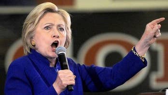 Press probes Clinton charity