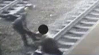 NJ Transit officer pulls man from tracks just before train arrives