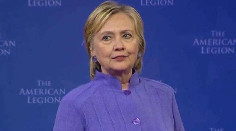 Clinton woos GOPers, independents amid high unfavorables