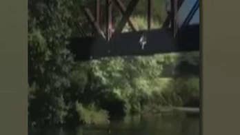 Mother, man accused of throwing boy off bridge cited for reckless endangerment