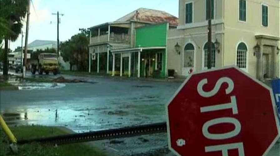 Hermine downgraded to tropical storm as it moves north