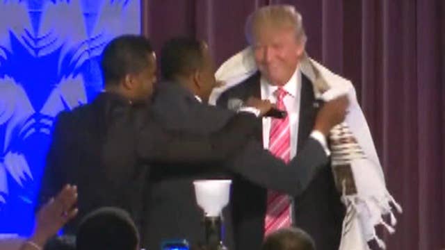 Trump gets 'gracious' reception at Detroit church
