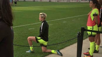 US soccer star Megan Rapinoe kneels during national anthem in 'little nod' to Kaepernick