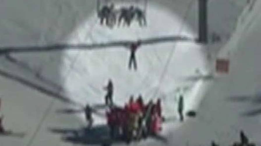 Terrifying moments for boy dangling from ski lift