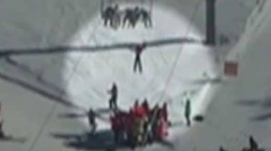 Terrifying moments for boy dangling from ski lift