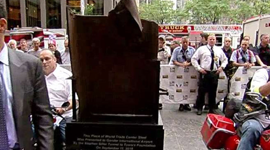 WTC beam begins journey to honor small town