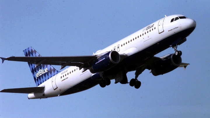 Woman sets blankets on fire aboard JetBlue flight