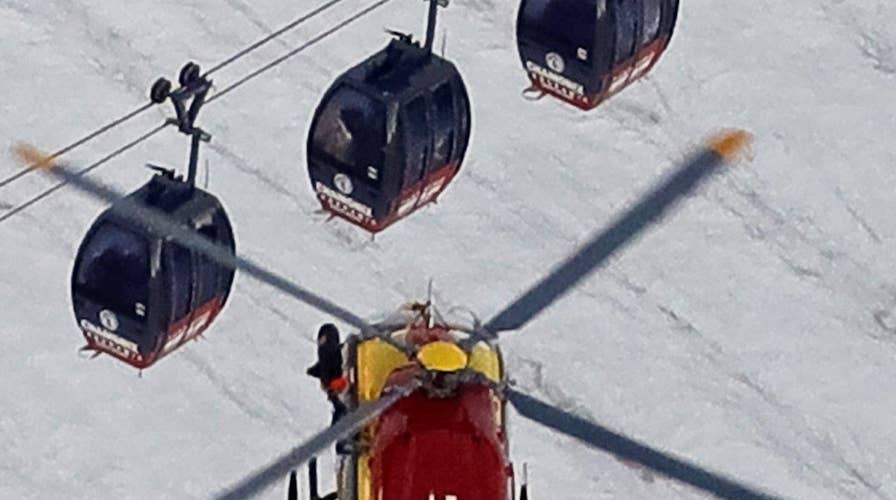 Rescuers save cable car passengers trapped in French Alps