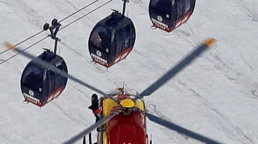 Rescuers save cable car passengers trapped in French Alps