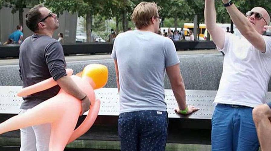 Cops ask men snapping selfies with blow up doll at 9 11 Memorial