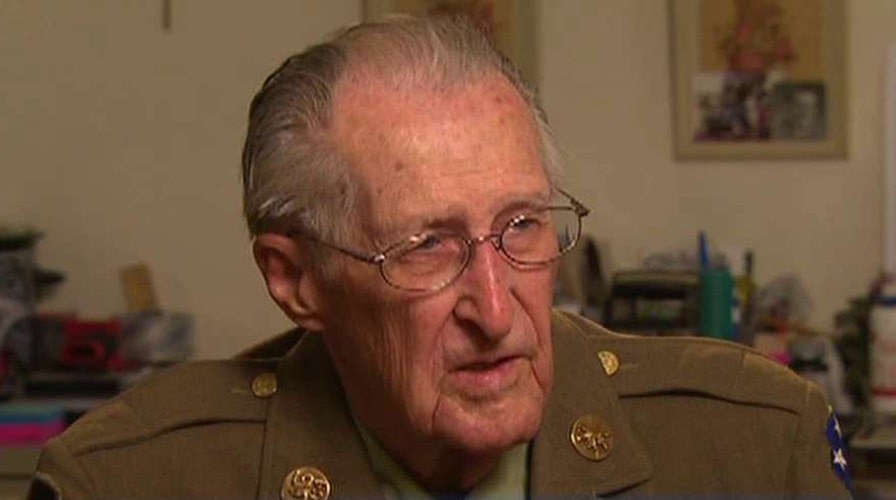 WWII veteran's caretakers steal his money