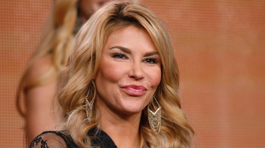 Does Brandi Glanville owe back taxes?