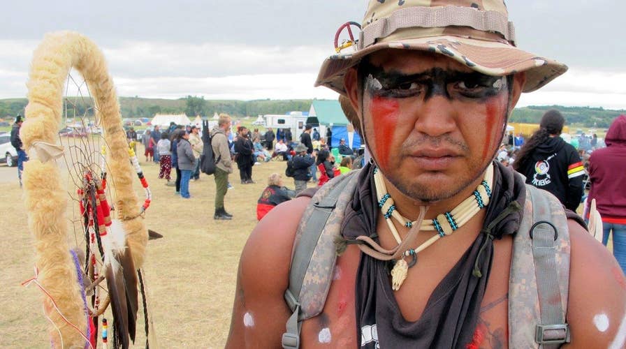 Protests grow over construction of North Dakota pipeline
