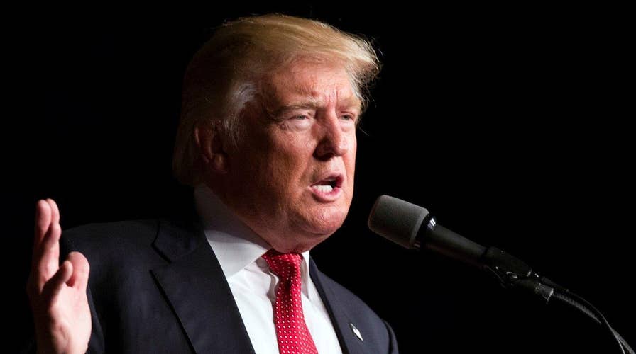 Trump lashes out at Clinton as he addresses terror attacks