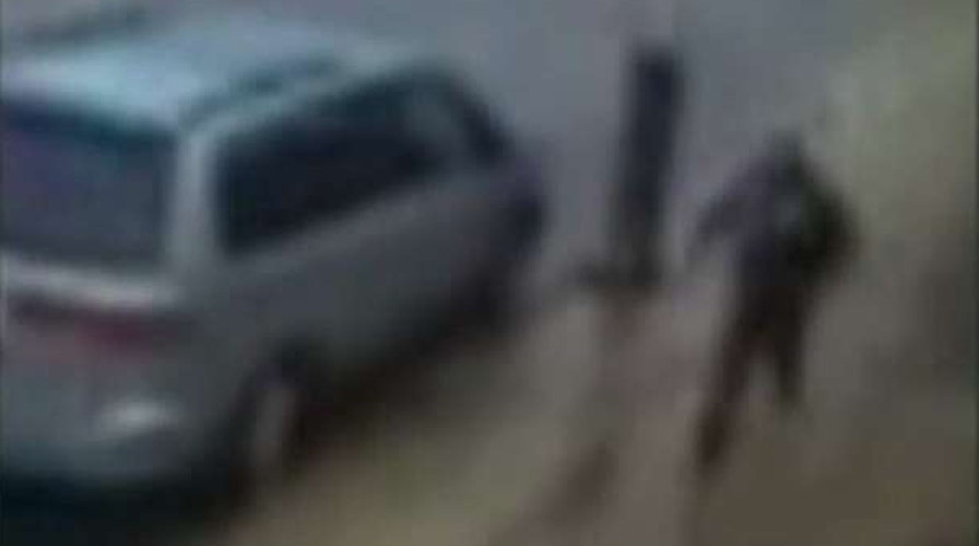 New video shows bombing suspect fleeing police