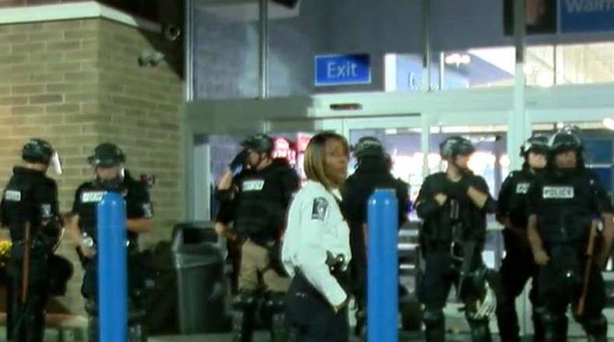Officers injured in protests after NC man killed by cop