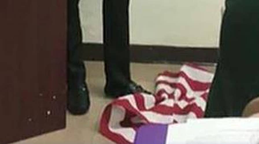 North Carolina teacher on leave after stomping on the flag