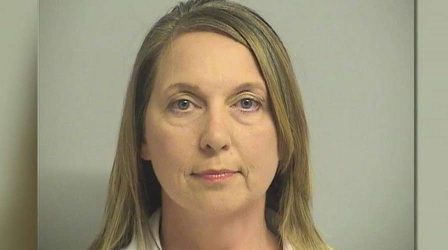 Tulsa cop turns herself in for shooting of unarmed man 