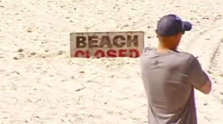 Shark attacks 17-year-old surfer