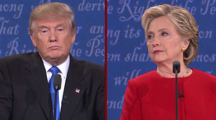 Clinton presses Trump on his business record