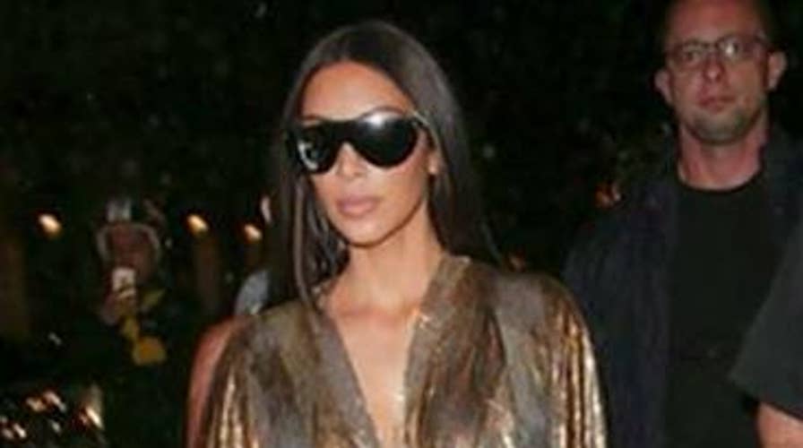 Kim Kardashian Flees Paris After Being Tied Up And Robbed By Masked ...