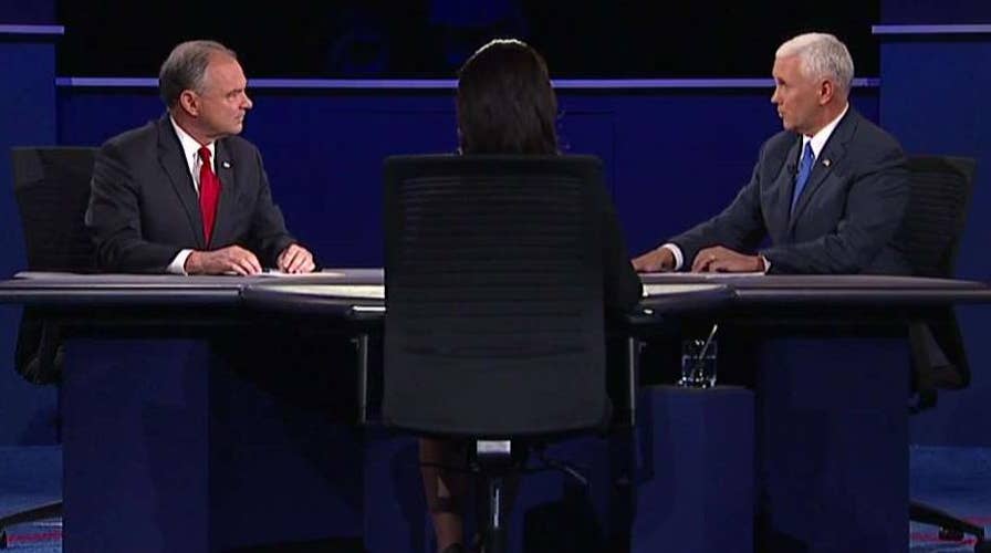 Mike Pence and Tim Kaine spar over immigration reform