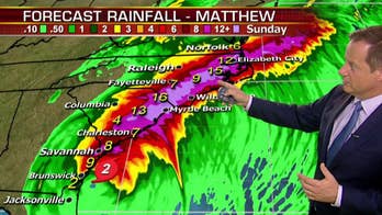 A weakening Matthew rakes Atlantic coast; US death toll at 9