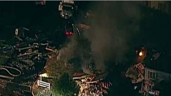 Gas explosion destroys townhouses, injures 2 in Chicago suburb