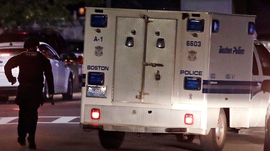 Boston police officers shot by suspect 'armed for battle'